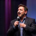 Photo of Vikram Bose, a comedian on stage